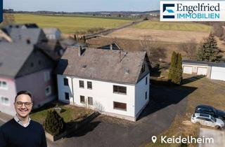 Haus kaufen in 55471 Keidelheim, Geräumiges Ein- bis Zweifamilienhaus mit drei Garagen auf großem Grundstück nahe Simmern
