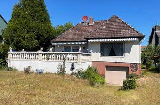 Haus kaufen in 65462 Ginsheim-Gustavsburg, Hervorragend gelegener kleiner Fertighausbungalow mit ca. 70,55 m² Wohnfläche auf dem 555 m² großen Südwestgrundstück in exzellenter Wohnlage von Ginsheim