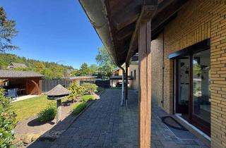 Wohnung kaufen in 21629 Neu Wulmstorf, Neu Wulmstorf - Stilvolle Erdgeschosswohnung mit eigenem Gartenanteil in Elstorf-Bachheide - Wohnen wie im Haus