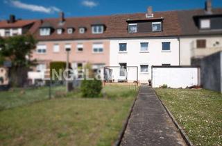 Haus kaufen in 97424 Oberndorf-Süd, Viel Platz für Ideen: Reihenmittelhaus mit Garten und Keller