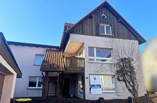 Haus kaufen in 97618 Unsleben, Zweifamilienhaus mit schöner Maisonettewohnung - zentrale Lage in Unsleben