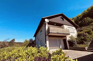 Haus kaufen in 35756 Mittenaar, Zweifamilienhaus mit ELW in toller Lage von Bicken