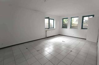 Gewerbeimmobilie kaufen in 55286 Wörrstadt, Attraktive Büroräume mit Souterrainwohnung in 6-Familienhaus
