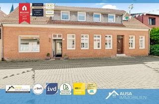 Haus kaufen in 48366 Laer, Zweifamilienhaus + Büroraum mit tollem Garten im Ortskern von Laer