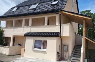 Mehrfamilienhaus kaufen in 72800 Eningen, Solides Zweifamilienhaus mit Modernisierung – zentrale Lage und sichere Mieteinnahmen