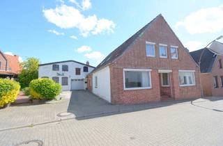 Einfamilienhaus kaufen in 25764 Wesselburen, Wesselburen - Zentral gelegenes Einfamilienhaus mit ausgebautem DG und kleiner Gewerbefläche in Wesselburen