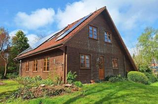 Einfamilienhaus kaufen in 24405 Mohrkirch, Mohrkirch - Zauberhaftes Holzbohlenhaus mit Einliegerwohnung in Mohrkirch