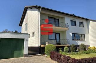 Doppelhaushälfte kaufen in 54595 Prüm, Doppelhaushälfte mit Garage und Garten in attraktiver Wohnlage