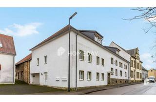 Anlageobjekt in 59602 Rüthen, Mehrfamilienhaus mit 4 Wohneinheiten, großem bebaubaren Garten/Grundstück und viel Potenzial