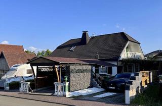 Einfamilienhaus kaufen in 56479 Neunkirchen, Charmantes Einfamilienhaus in Feldrandlage mit traumhaftem Ausblick