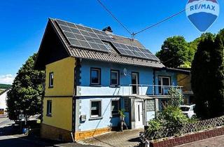 Einfamilienhaus kaufen in 65558 Isselbach, Einfamilienhaus mit Garage, Garten, Nebengebäude und PV-Anlage in Isselbach