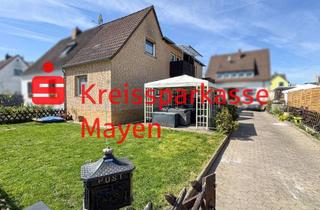 Einfamilienhaus kaufen in 56626 Andernach, Vermietetes Einfamilienhaus mit Garten und Garage