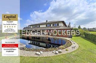 Villa kaufen in 56593 Güllesheim, Mediterrane Landhausvilla auf Parkgrundstück mit Teichanlage