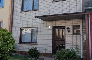 Reihenhaus kaufen in 56218 Mülheim-Kärlich, Charmantes Reihenhaus mit Garten, Terrasse und Garage – viel Potenzial zur individuellen Gestaltung