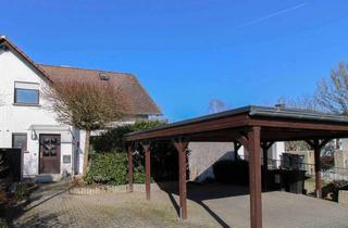 Anlageobjekt in 61267 Neu-Anspach, Charmante Doppelhaushälfte mit ELW in Feldrandlage – Großzügiger Garten und überdachte Stellplätze!