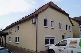 Mehrfamilienhaus kaufen in 38462 Grafhorst, Solide Kapitalanlage: 3er-Mehrfamilienhaus mit Garage, Carport und Stellplätzen