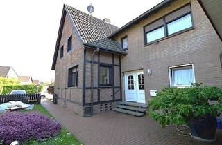 Doppelhaushälfte kaufen in 46395 Bocholt, Eigentumswohnung in Form einer Doppelhaushälfte mit 4 SZ und Garten!