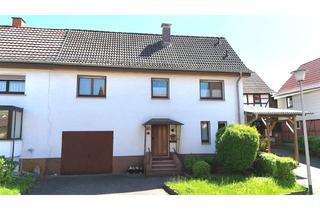 Doppelhaushälfte kaufen in 36208 Wildeck, Gepflegte Doppelhaushälfte mit Garage und Garten in Obersuhl