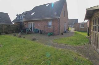 Anlageobjekt in 25899 Niebüll, DHH mit Treppenlift und Garten in urbaner Lage