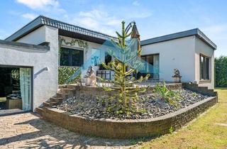 Haus kaufen in 34314 Espenau, Espenau / Hohenkirchen - Großzügiger und moderner Bungalow in Ortsrandlage von Espenau!