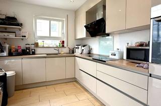Wohnung kaufen in 86462 Langweid, Moderne Erdgeschosswohnung mit Garten, Terrasse und Garage – 3-Zimmer-Wohlfühloase!