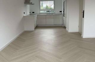 Wohnung kaufen in Im Hasenwinkel 32, 30827 Garbsen, Stilvoll sanierte Whg. mit großem Garten u. Garage