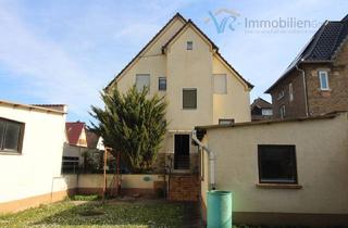 Einfamilienhaus kaufen in 65474 Bischofsheim, Bischofsheim - Freistehendes Einfamilienhaus in Bischofsheim zum Verkauf mit Garage und Garten