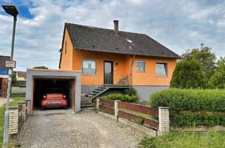 Einfamilienhaus kaufen in 88483 Burgrieden, Burgrieden - Zwei Wohnungen unter einem Dach - Wohnen mit traumhaftem Ausblick ins Grüne