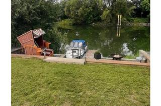 Einfamilienhaus kaufen in 14712 Rathenow, Rathenow - Haus auf Wassergrundstück mit Boot