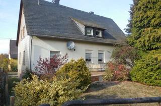 Haus kaufen in Thiergartenstraße 47, 55496 Argenthal, Haus mit Doppelgarage und großem Werkraum, ideal für Handwerker oder Hobbyschrauber