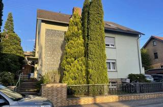 Haus kaufen in 65232 Taunusstein, lukrative Kapitalanlage 3 Familienhaus mit großer Garage und Apartment im Soutterain