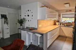 Wohnung kaufen in 72644 Oberboihingen, Oberboihingen - Moderne 4,5 Zimmer Erdgeschosswohnung mit Tiefgarage und Aufzug