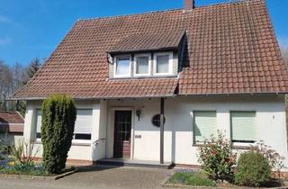 Haus kaufen in 49170 Hagen, Hagen - Zweifamilienhaus aus den 60er Jahren in 49170 Hagen a.T.W.