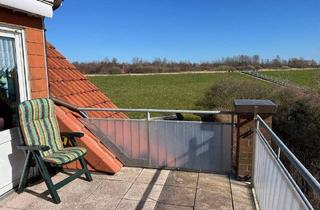 Wohnung kaufen in 26434 Wangerland, Wangerland - Ankommen, durchatmen, zuhause sein - direkt am Deich - Charmante Dachgeschosswohnung mit ausgebautem Spitzboden