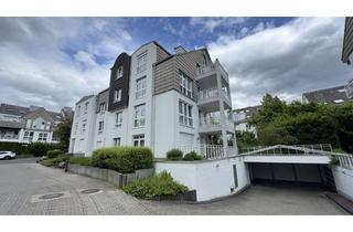 Wohnung kaufen in Herblayer Straße, 65232 Taunusstein, Moderne 2-Zimmer-Gartenwohnung mit Kamin & eigenener Garage