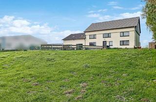 Haus kaufen in 37589 Kalefeld, Großes Zweifamilienhaus mit drei Garagen auf ca. 5.900 m² Grundstück in Kalefeld-Düderode