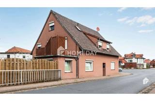Wohnung kaufen in 38554 Weyhausen, Gemütliche Erdgeschosswohnung mit überdachter Terrasse und Gartenidylle in Weyhausen