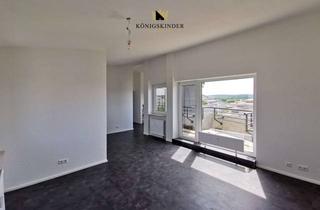 Wohnung kaufen in 71282 Hemmingen, Helle 2,5-Zimmer-Atelierwohnung mit Balkon und Weitblick in den Hemminger Himmelsleitern