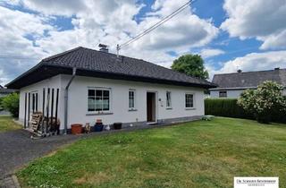 Haus kaufen in 56459 Bellingen, Ebenerdiger Bungalow mit 2 Garagen und pflegeleichtem Grundstück!