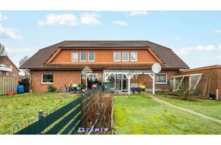 Anlageobjekt in 49593 Bersenbrück, Attraktives Mehrfamilienhaus mit 4 WEs, Garten und Garagen in Bersenbrück