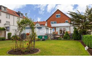 Anlageobjekt in 31028 Gronau, Attraktives 3-Familienhaus mit Garten und Garagen in Gronau