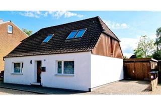 Einfamilienhaus kaufen in 24589 Nortorf, Nortorf - Einfamilienhaus mit Garten, Carport und Atelier