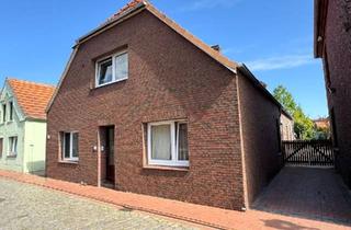 Mehrfamilienhaus kaufen in 26409 Wittmund, Wittmund - Mehrfamilienhaus mit 5 Wohneinheiten und schönem Garten