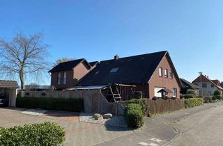 Haus kaufen in 49685 Emstek, Teilmodernisiertes, großzügiges Wohnhaus mit 2 Wohneinheiten, Keller und Garagen