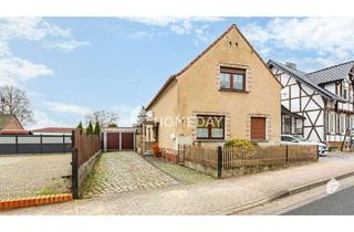 Einfamilienhaus kaufen in 39326 Rogätz, Einfamilienhaus mit schönem Grundstück und Gestaltungspotenzial – Ideal für kreative Hände