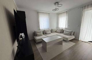Wohnung kaufen in Pyrbaumer Straße 5a, 92353 Postbauer-Heng, Geschmackvolle 2,5-Zimmer-Wohnung in Postbauer-Heng mit Gartenanteil