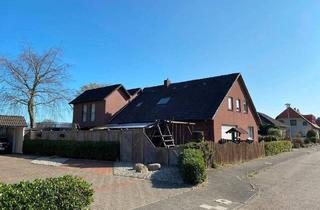 Haus kaufen in 49685 Emstek, Emstek - Teilmodernisiertes, großzügiges Wohnhaus mit 2 Wohneinheiten, Keller und Garagen