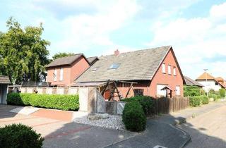 Haus kaufen in 49685 Emstek, Emstek - Teilmodernisiertes, großzügiges Wohnhaus mit 2 Wohneinheiten, Keller und Garagen