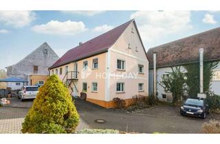 Mehrfamilienhaus kaufen in 91469 Hagenbüchach, Charmantes Mehrfamilienhaus mit zwei Wohneinheiten in ruhiger Lage von Hagenbüchach