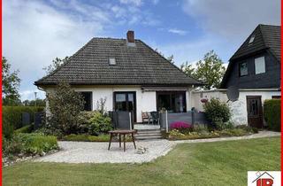 Einfamilienhaus kaufen in 26939 Ovelgönne, Niedliches, gepflegtes Einfamilienhaus mit großem Garten